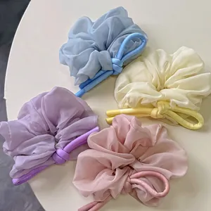 Elegant oversized organza hair scrunchies in pastel colors for high ponytail hairstyles