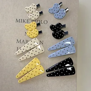 Chic set of colorful polka dot resin hair clips in round bean and triangle shapes