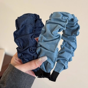 Wide pleated denim headbands in light and dark blue styles for a minimalist look
