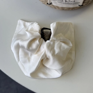 Elegant cream satin bow shark hair claw clip for a minimalist and sweet hairstyle look
