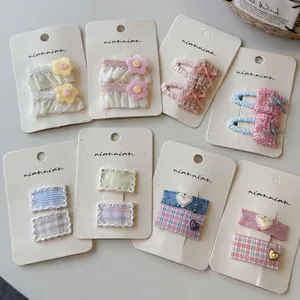 Set of eight pairs of Korean style lace and floral fabric hair clips for young girls