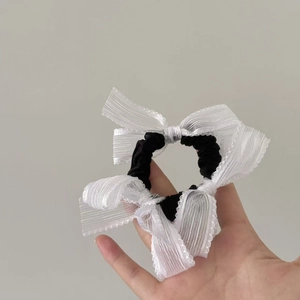 Elegant black lace scrunchie with three white organza bows for sweet hairstyle styling
