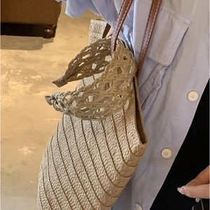 Minimalist straw woven hollow headband and matching shoulder bag in natural beige color