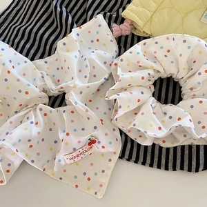Polka dot hair scrunchie and headband set in white textured fabric with colorful patterns