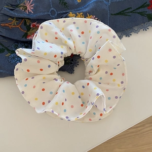 Polka dot oversized hair scrunchie in white chiffon fabric with colorful patterns