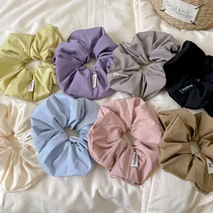 Set of 8 oversized ribbed fabric scrunchies in cream Morandi colors for ponytail styling