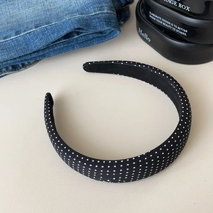 Classic black and white polka dot wide headband with vintage French minimalist style