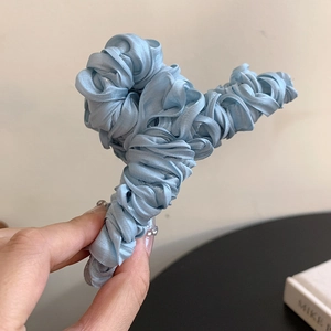 Elegant sky blue satin fabric claw clip with pleated texture for women hair styling