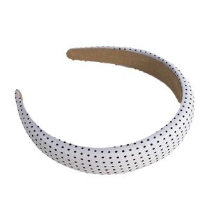 Vintage white polka dot headband for women with a padded retro French style design