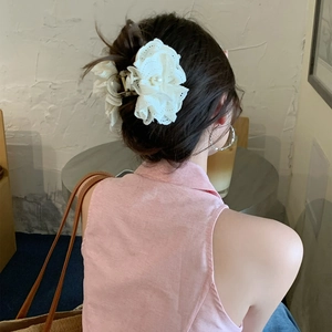 Elegant white lace flower hair claw clip with pearl center for women's half-up hairstyle