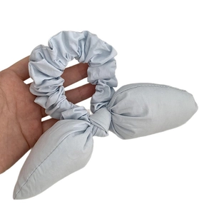 Light blue bunny ear bow scrunchie for women made of soft fabric for ponytail styling