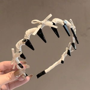 Ballet style white ribbon headband with three bows and sparkling colorful gemstones