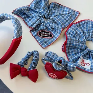 Cute Korean red and blue plaid scrunchie set with embroidery on white background