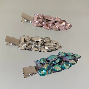 Lot de trois barrettes à cheveux élégantes avec des cristaux de zircone étincelants colorés