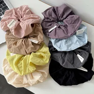 French cream style large scrunchies set in eight assorted matte colors and soft texture