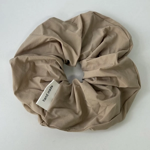 French cream scrunchie in light brown with handmade label for ponytail hairstyles