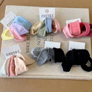 Set of 4 high-elasticity ice silk hair ties in various pastel colors on display cards