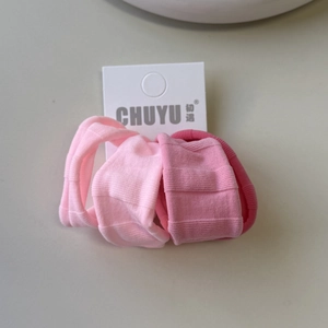 Close-up of pink gradient elastic ice silk hair ties with soft vertical knit textures