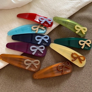 Set di 9 fermagli per capelli colorati in resina traslucida con dolci fiocchi a goccia