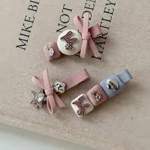Set di fermagli per capelli con fiocchi rosa e blu decorati con strass lucidi