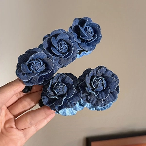 Deep blue denim rose floral hair clip for women featuring layered petal design