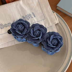 Elegant denim blue triple rose flower hair clip for women with a stylish vintage design