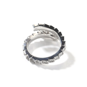 Macro shot of silver dragon ring with micro-set cubic zirconia in a spiral design