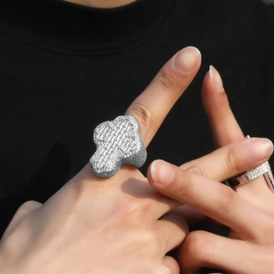 Close-up of iced out hip hop ring with baguette cut zircons and pave set stones