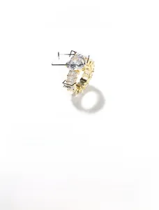 Macro detail of gold-plated brass heart ring featuring AAAAA grade cubic zirconia inlay