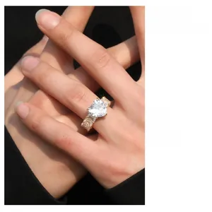 Detail view of heart-shaped zircon ring with champagne stones on gold-plated band