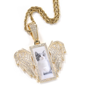 Detailed view of custom rectangle photo pendant with sparkling wings on rope chain