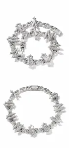 Close-up of hip-hop iced out Cuban link chain with silver gothic letters and zircons