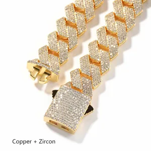 Macro detail of 19mm gold plated hip hop Cuban link chain with micro paved zircon stones