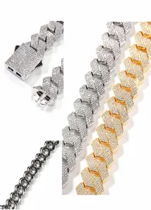 Macro detail of 19MM iced out cuban link chain with high density zircon paved clasps