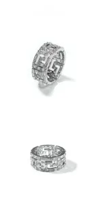 Macro detail of silver geometric wide ring with baguette and round cubic zirconia inlay