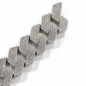Macro detail of 19MM diamond-cut Cuban link necklace with full zircon pavé stones