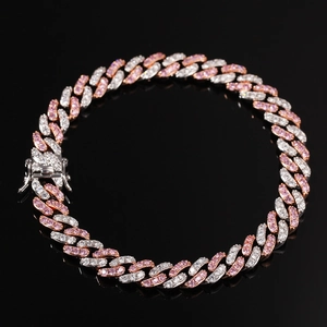 Detailed macro view of 9mm iced out cuban link anklet with pink and white cubic zirconia