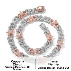 Macro detail of 10mm hip hop Cuban link chain with stars and zircons in rose gold and silver