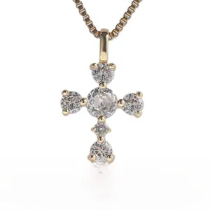 Detailed close-up of 925 silver cross pendant featuring sparkling round-cut zircon stones