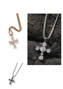 Detail of S925 silver hip-hop cross pendant with claw-set zircon and box chain