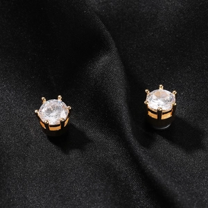 Macro shot of 8mm gold-plated crown stud earrings with clear round cubic zirconia
