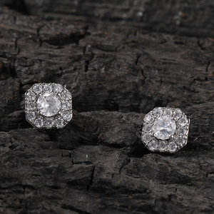 Close-up of hip hop 8mm cz magnetic cross stud earrings with iced-out snowflake design