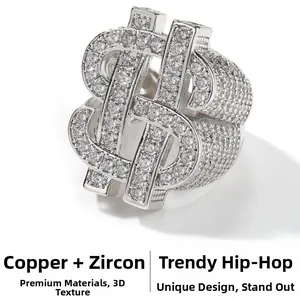 Detail of hip hop silver ring featuring hollow dollar sign symbol with white cubic zircon