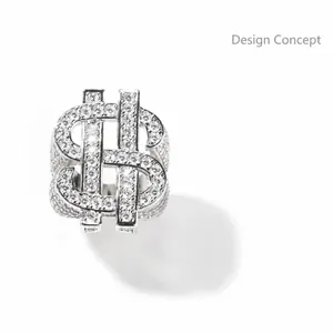 Macro shot of silver hip hop ring featuring a dollar sign covered in white zircons