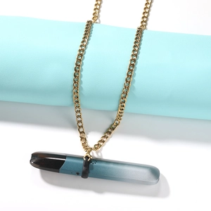 Close-up of e-cigarette with gold chain lanyard on light blue leather background