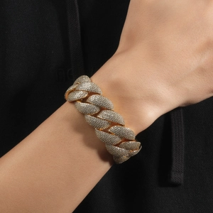 Close-up of luxury 24mm gold plated Cuban link chain with micro-paved cubic zirconia stones