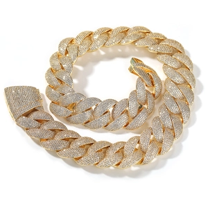Close-up of a 24mm gold plated Cuban link chain necklace with sparkling zircon pavé