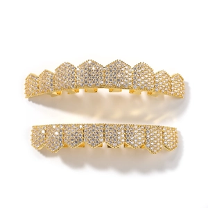 Detail of hip hop grillz with gold plating and cubic zirconia micro-pave setting