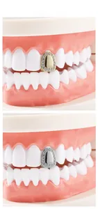 Macro detail of gold and silver single tooth grillz with micro-pave cubic zirconia crystals