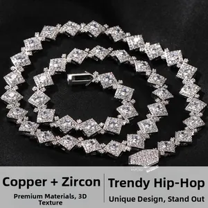 Macro detail of silver-colored copper hip hop chain necklace fully set with zircons